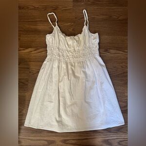 Reformation Kathleen spaghetti-straps mini dress in white.
